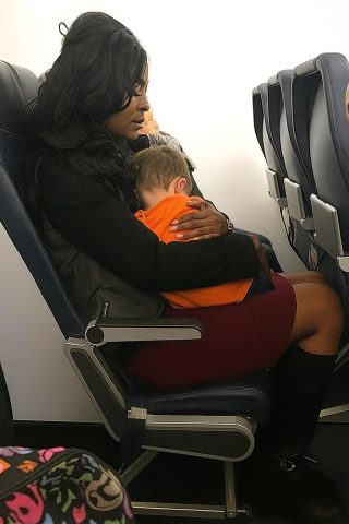 HE CRAWLED INTO MY LAP MID-FLIGHT—AND NO ONE CAME TO CLAIM HIM